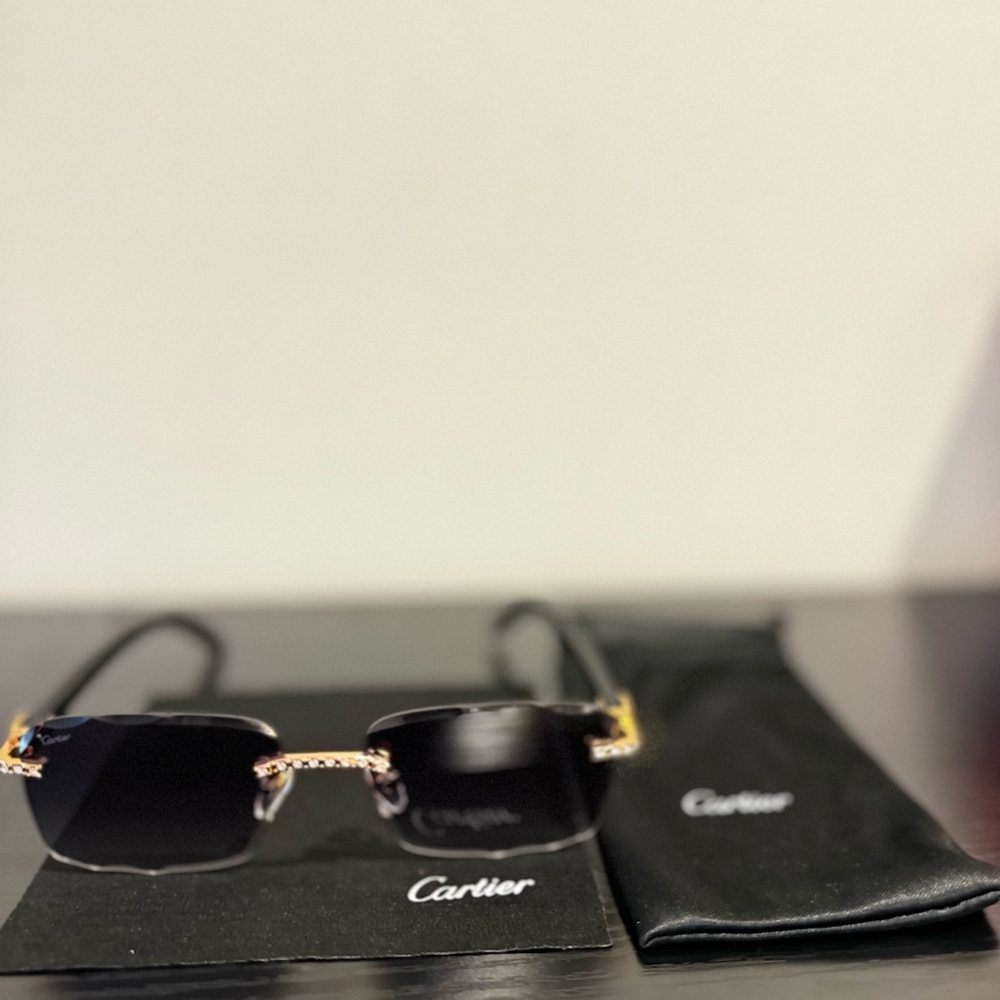 Cartier Luxurious Black and Gold Sunglasses